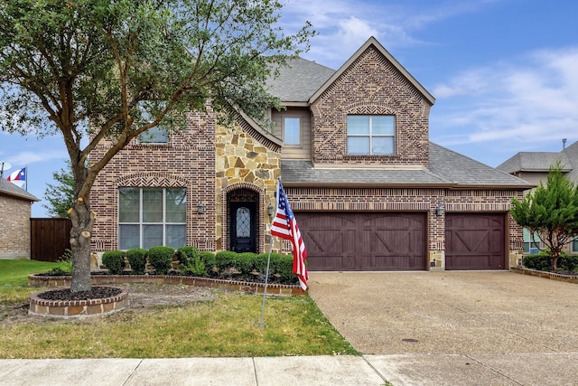 view of front of property with a garage