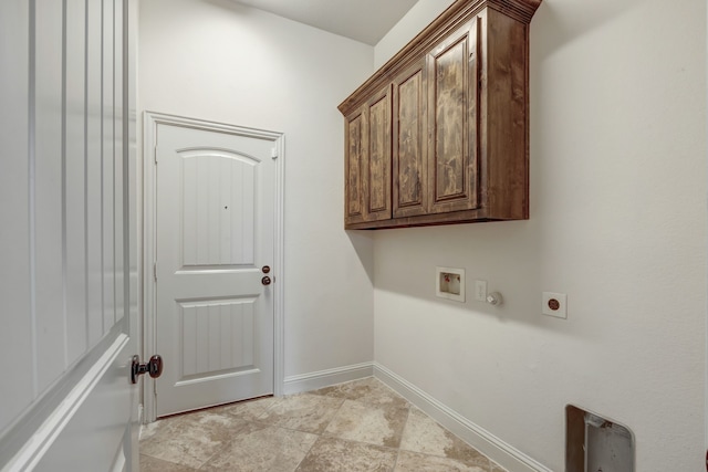 laundry area with hookup for a washing machine, light tile patterned floors, hookup for an electric dryer, and cabinets