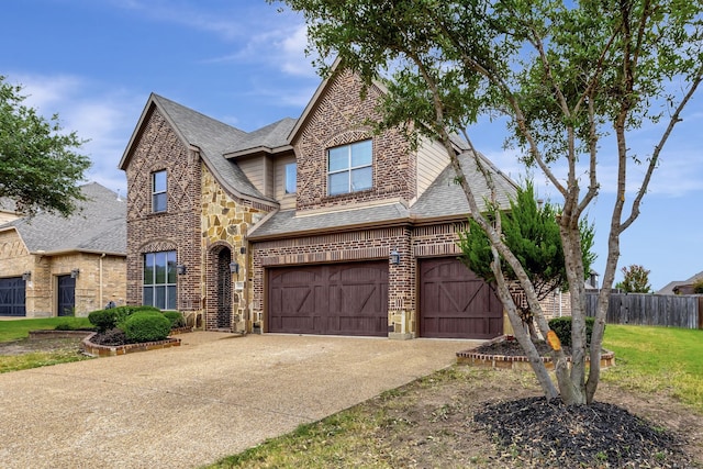 view of front of home with a garage