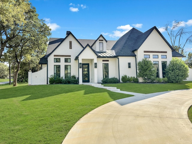 view of front of home with a front yard