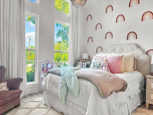 bedroom with light hardwood / wood-style floors