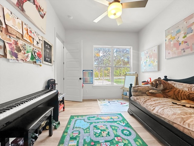 interior space with ceiling fan and light wood-type flooring