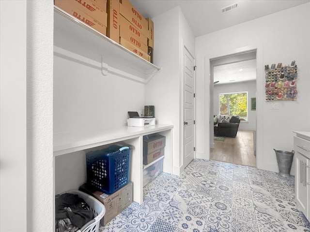 mudroom featuring light wood-type flooring