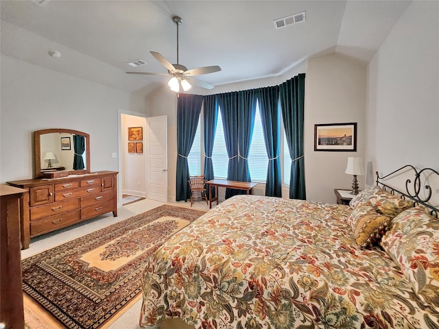 bedroom with ceiling fan and lofted ceiling