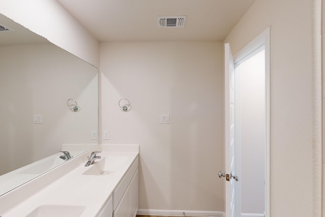 bathroom featuring vanity