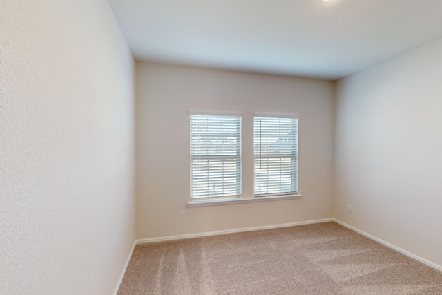 empty room with light carpet