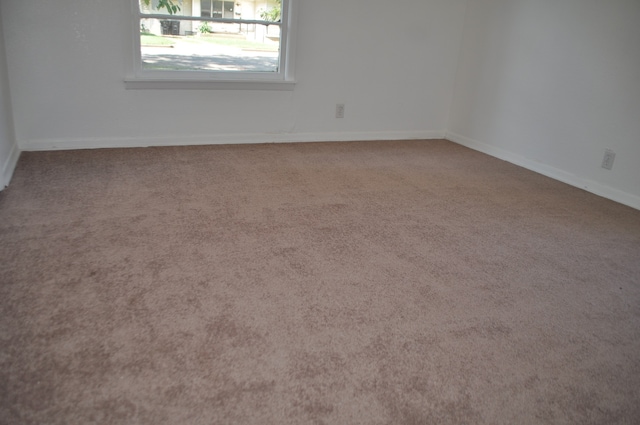 spare room with carpet flooring