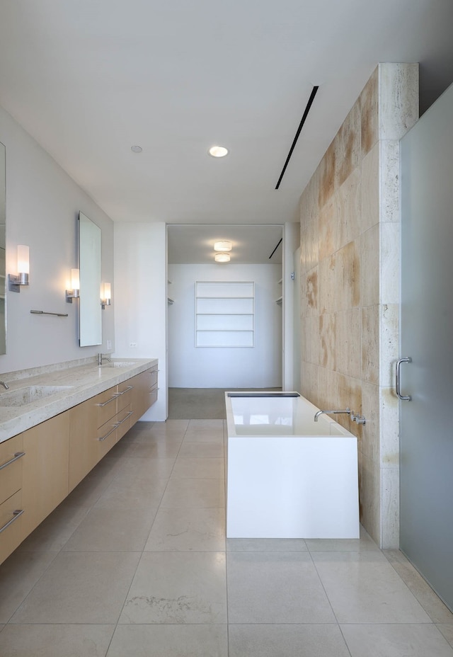 bathroom with tile walls, vanity, and plus walk in shower