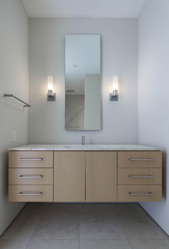 bathroom featuring vanity and tile patterned floors