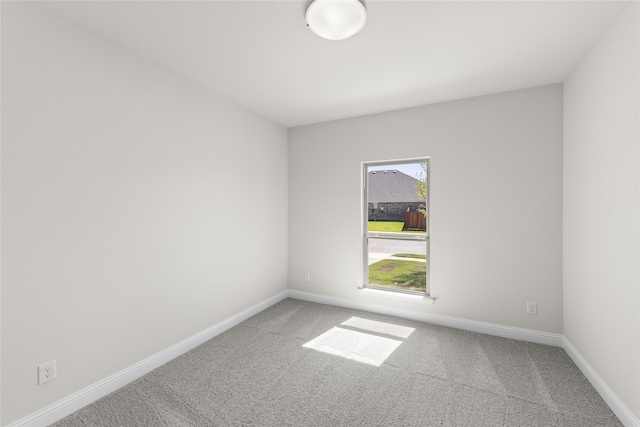 unfurnished room featuring carpet floors