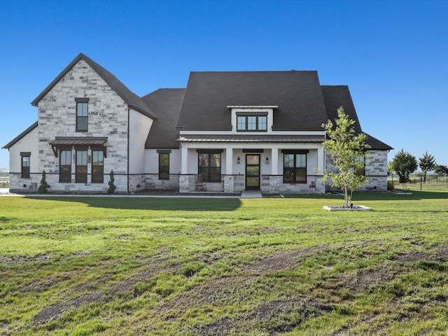 view of front of property featuring a front lawn