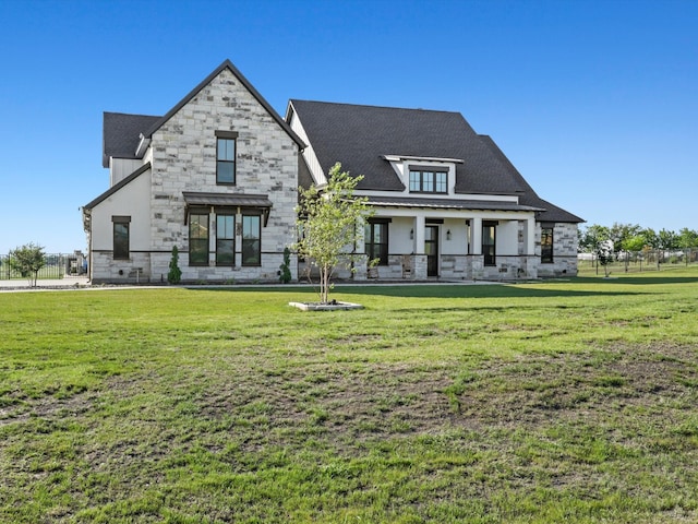 view of front of home with a front lawn