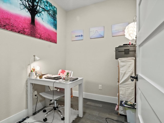 home office with hardwood / wood-style floors