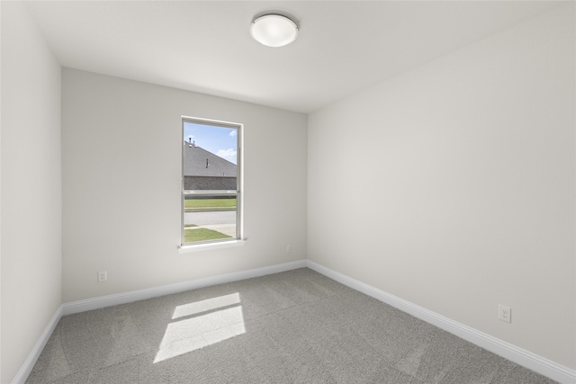 empty room featuring carpet floors