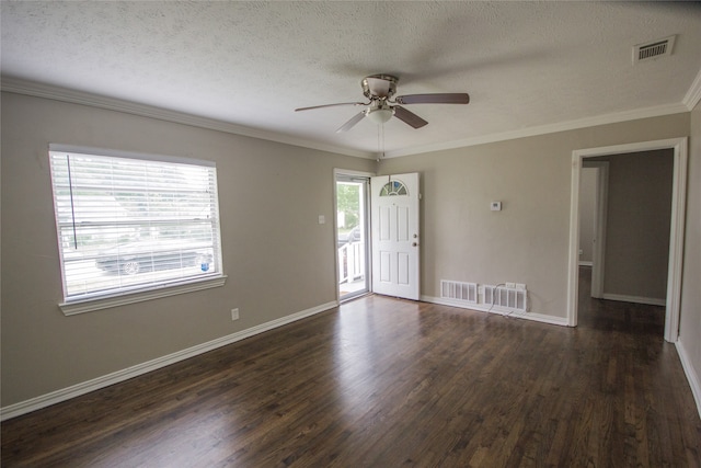 unfurnished room with a textured ceiling, dark hardwood / wood-style floors, ceiling fan, and crown molding