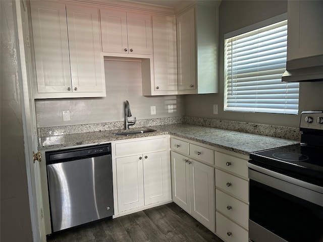 kitchen featuring a textured ceiling, sink, stainless steel range with electric cooktop, and dark hardwood / wood-style floors