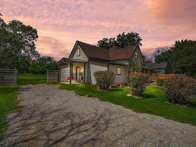 view of front of home featuring a yard