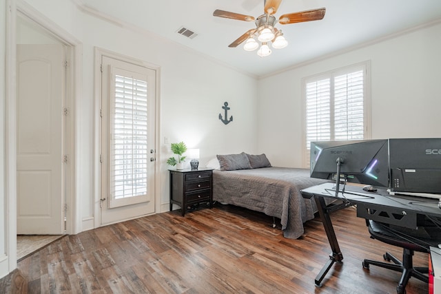 bedroom featuring access to outside, crown molding, hardwood / wood-style flooring, and ceiling fan