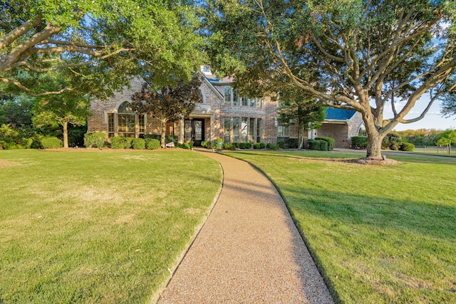 view of front of home with a front yard