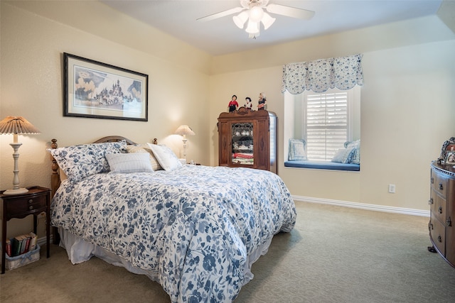 bedroom with light carpet and ceiling fan