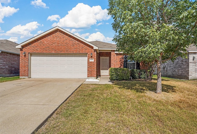 view of front facade featuring a garage and a front lawn