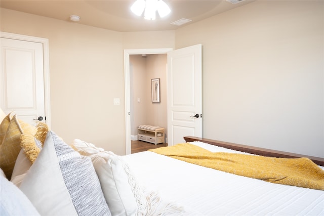 bedroom featuring wood-type flooring and ceiling fan