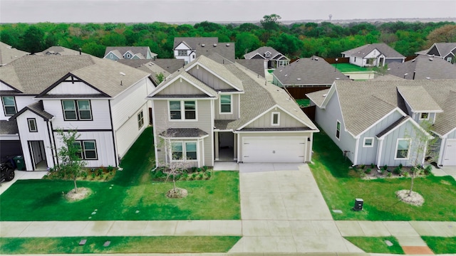 exterior space featuring a garage and a front yard