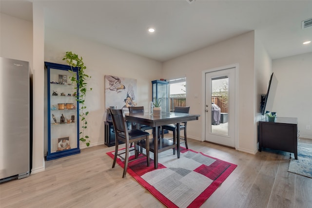 dining area featuring light hardwood / wood-style flooring