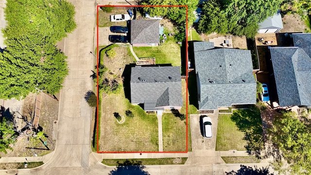 bungalow-style home featuring a front yard