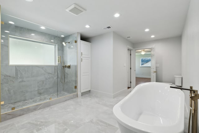 bathroom featuring plus walk in shower