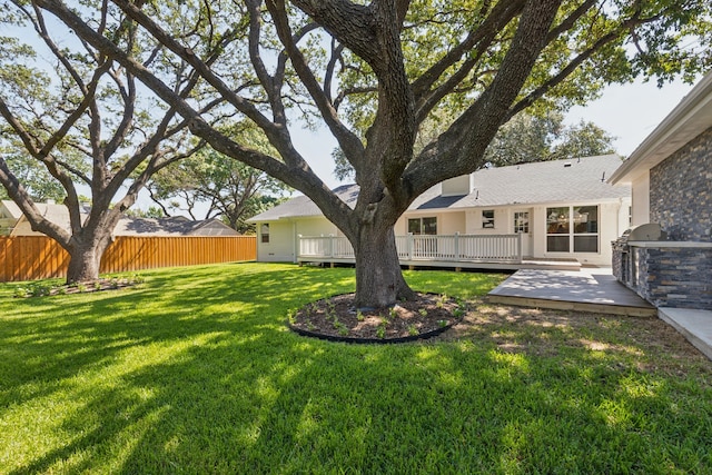 view of yard featuring a deck