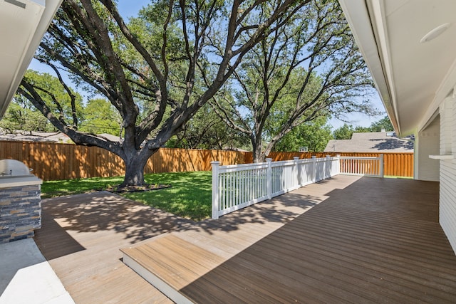 deck featuring a lawn