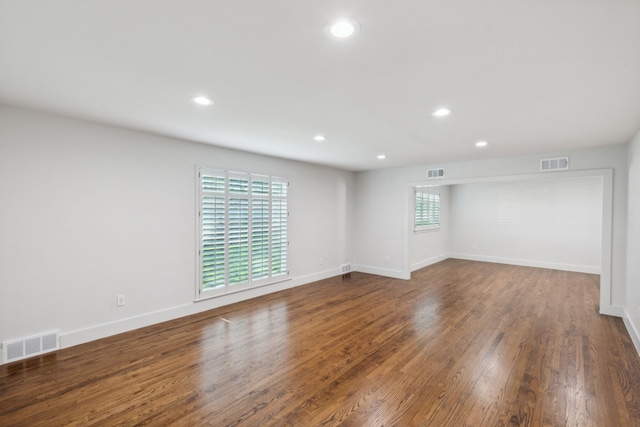 empty room featuring dark hardwood / wood-style floors