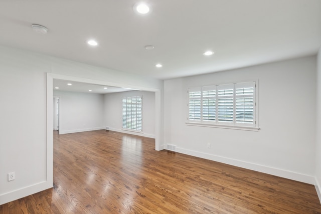 empty room featuring hardwood / wood-style floors