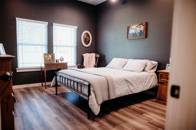 bedroom featuring wood-type flooring