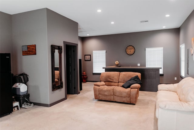 living room with light carpet