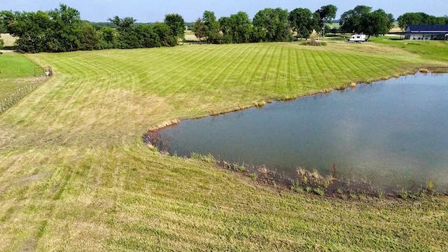 aerial view with a water view and a rural view