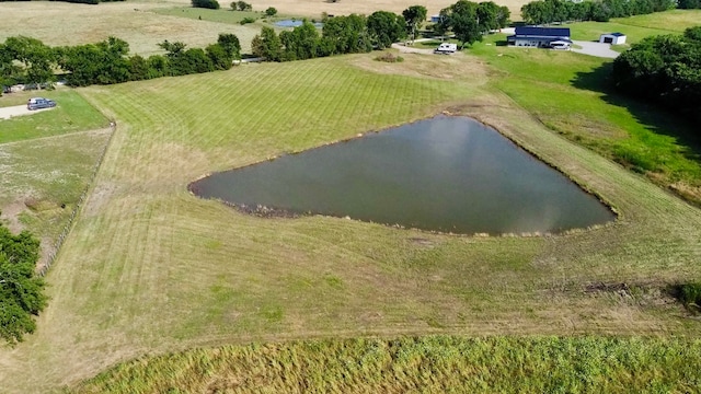 bird's eye view featuring a rural view and a water view