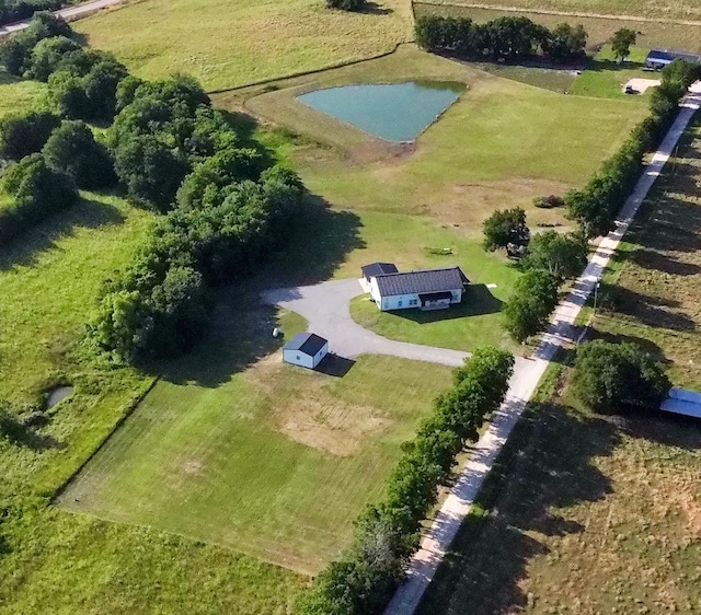 birds eye view of property featuring a rural view