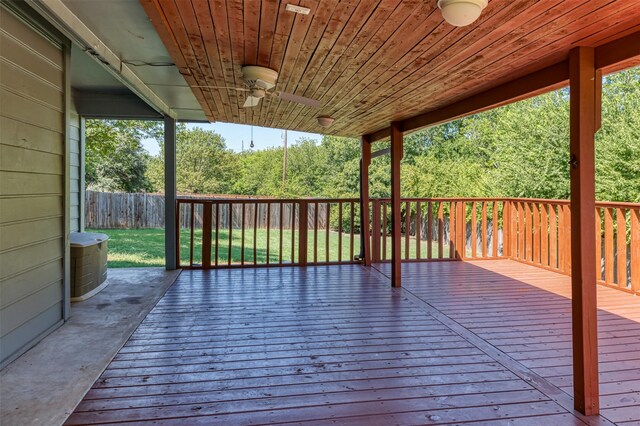 wooden deck with a yard