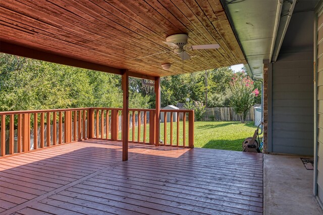 wooden deck with a yard