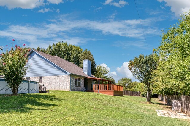 view of yard featuring a deck