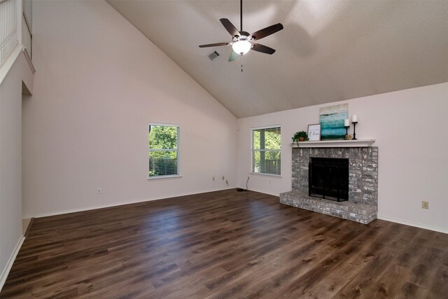 unfurnished living room featuring high vaulted ceiling, ceiling fan, and dark wood-type flooring