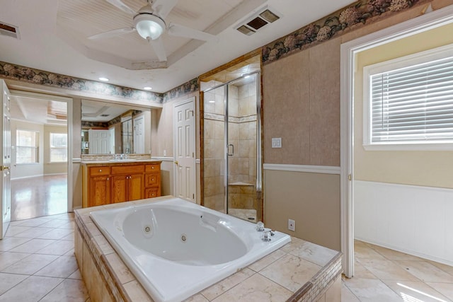 bathroom with ceiling fan, independent shower and bath, and vanity