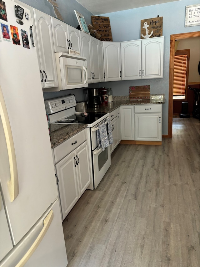 kitchen featuring light hardwood / wood-style flooring, white appliances, and white cabinetry