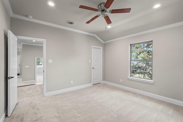 unfurnished bedroom with ceiling fan, crown molding, light colored carpet, and lofted ceiling