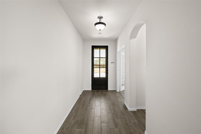 entryway with dark hardwood / wood-style floors