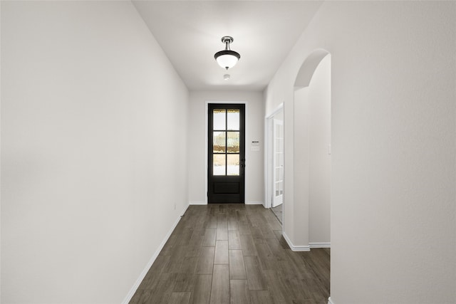 doorway to outside featuring dark hardwood / wood-style flooring