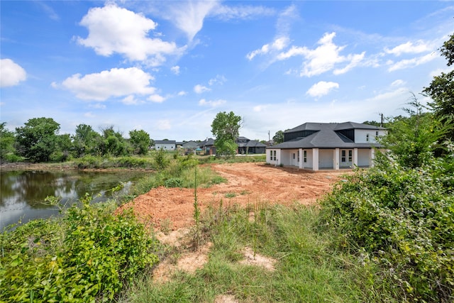 view of yard with a water view