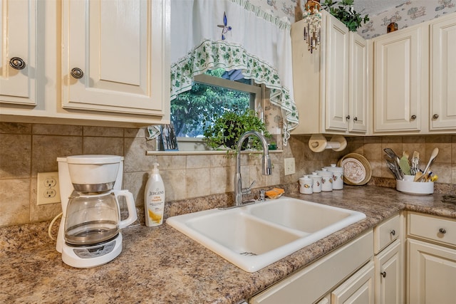 kitchen with decorative backsplash and sink